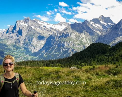 Top hike from Grindelwald, smiling girl hiking up to Männlichen peak