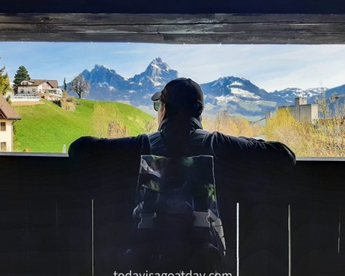 Easy hike in canton Schwyz, Krisztian looking out at Wilerbrücke