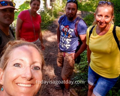 Group picture of 5 family members in the forest on the mountain view trail