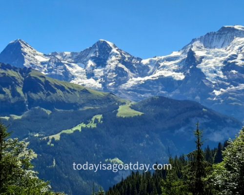 Hiking in the Jungfrau region, first glimpse of the Eiger, Mönch and Jungfrau