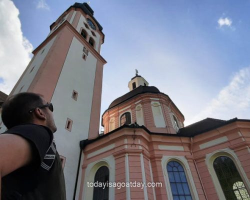 Man admiring Fischingen Abbey after this great Fischingen walk, Walk and Hike in Fischingen