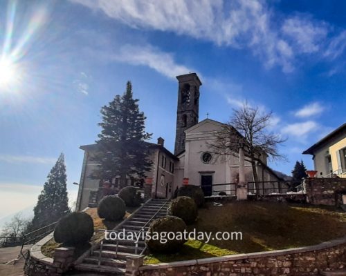 Top hike in Ticino, entering Brè, church