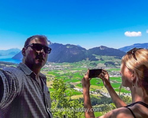 Hike in Central Switzerland, couple taking selfie at Gibelhorn viewpoint