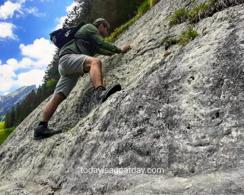 great hike in Appenzell, man rock climbing