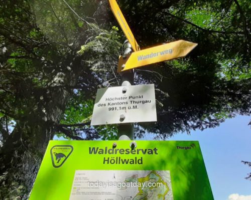 walk on Fischingen trail, yellow and white signage stating the highest point in canton Thurgau, Walk and Hike in Fischingen