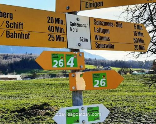 Circular hike around Spiez, yellow sign in Spiezmoos