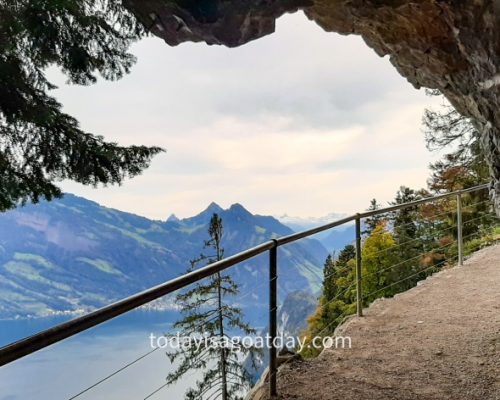 Hike in Central Switzerland, view out of the rock of Lake Lucerne